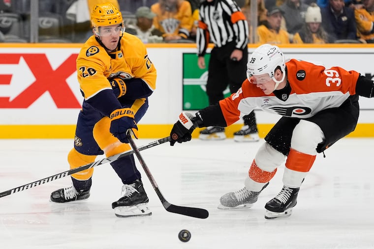 Flyers' Matvei Michkov (right) scored a goal for the first time since Oct. 16 with a second period goal against the Predators on Thursday night in Nashville.