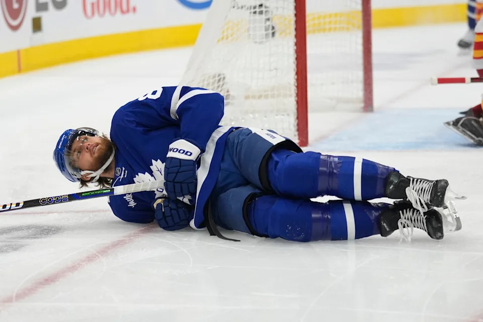 Toronto Maple Leafs forward William Nylander (88) lies on the ice after a collision.John E&period; Sokolowski-Imagn Images