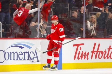 Feb 23, 2025; Detroit, Michigan, USA; Detroit Red Wings right wing Patrick Kane (88) celebrates a goal during the first period of the game between the Detroit Red Wings and the Anaheim Ducks at Little Caesars Arena. Mandatory Credit: Brian Bradshaw Sevald-Imagn Images Feb 23, 2025; Detroit, Michigan, USA; Detroit Red Wings right wing Patrick Kane (88) celebrates a goal during the first period of the game between the Detroit Red Wings and the Anaheim Ducks at Little Caesars Arena. Mandatory Credit: Brian Bradshaw Sevald-Imagn Images