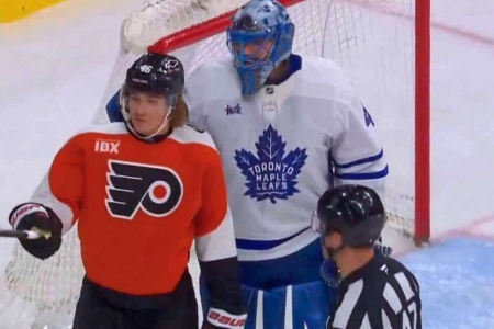 Toronto Maple Leafs goalie Anthony Stolarz holds Flyers forward Trevor Zegras back from a scrum. Toronto Maple Leafs goalie Anthony Stolarz holds Flyers forward Trevor Zegras back from a scrum.