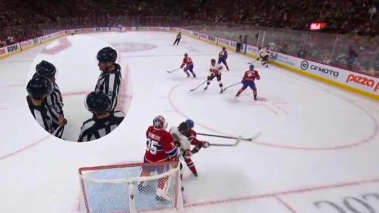Photo of Referees during Canadiens-Senators Game Photo of Referees during Canadiens-Senators Game