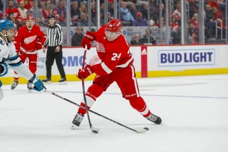 Dec 7, 2023; Detroit, Michigan, USA; Detroit Red Wings center Klim Kostin (24) shoots the puck during the second period at Little Caesars Arena. Mandatory Credit: Brian Bradshaw Sevald-Imagn Images Dec 7, 2023; Detroit, Michigan, USA; Detroit Red Wings center Klim Kostin (24) shoots the puck during the second period at Little Caesars Arena. Mandatory Credit: Brian Bradshaw Sevald-Imagn Images