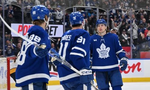 Dec 4, 2024; Toronto, Ontario, CAN; Toronto Maple Leafs forwards William Nylander (88) and John Tavares (91) acknowledge forward Matthew Knies (23) after his no-look pass set up Nylander for a goal against the Nashville Predators in the third period at Scotiabank Arena