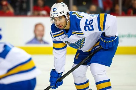 Oct 11, 2025; Calgary, Alberta, CAN; St. Louis Blues right wing Jordan Kyrou (25) during the face off against the Calgary Flames during the third period at Scotiabank Saddledome.