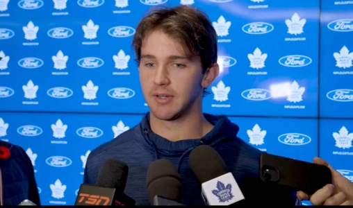 Joseph Woll addresses the media in his first appearance since his leave of absence.