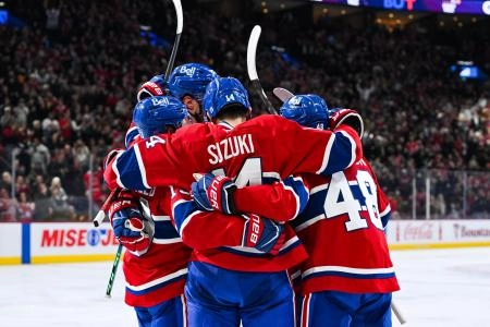Nov 4, 2025; Montreal, Quebec, CAN; Montreal Canadiens center Nick Suzuki (14) celebrates with his teammates his goal against the Philadelphia Flyers during the second period at Bell Centre. Mandatory Credit: David Kirouac-Imagn Images