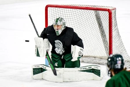 Michigan State's Trey Augustine blocks the puck during hockey practice on Thursday, Sept. 25, 2025, at Munn Arena in East Lansing.