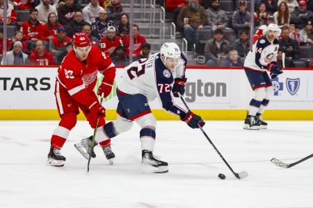 Mar 19, 2024; Detroit, Michigan, USA; Columbus Blue Jackets right wing Carson Meyer (72) handles the puck during the first period of the game against the Detroit Red Wings at Little Caesars Arena.