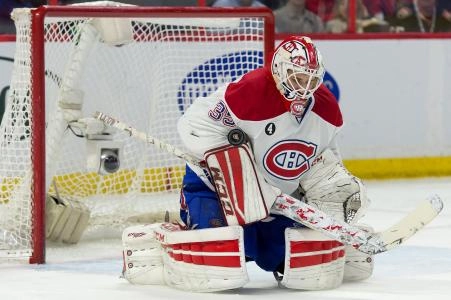 Feb 18, 2015; Ottawa, Ontario, CAN; Montreal Canadiens goalie Dustin Tokarski (35) makes a save in the second period against the Ottawa Senators at the Canadian Tire Centre.