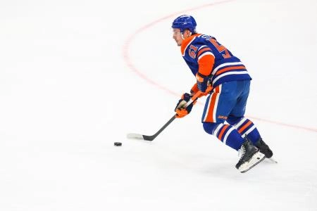 Jun 14, 2025; Edmonton, Alberta, CAN; Edmonton Oilers defenseman Troy Stecher (51) controls the puck against the Florida Panthers during the first period in game five of the 2025 Stanley Cup Final at Rogers Place.
