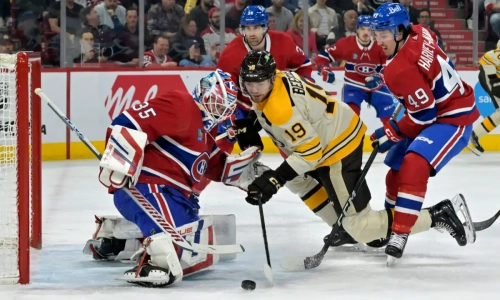 Mar 14, 2024; Montreal, Quebec, CAN; Montreal Canadiens goalie Sam Montembeault (35) stops Boston Bruins forward John Beecher (19) during the first period at the Bell Centre. Mar 14, 2024; Montreal, Quebec, CAN; Montreal Canadiens goalie Sam Montembeault (35) stops Boston Bruins forward John Beecher (19) during the first period at the Bell Centre.