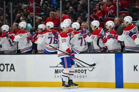 Oct 28, 2025; Seattle, Washington, USA; Montreal Canadiens left wing Juraj Slafkovsky (20) celebrates with the bench after scoring a goal against the Seattle Kraken during the first period at Climate Pledge Arena. Mandatory Credit: Steven Bisig-Imagn Images