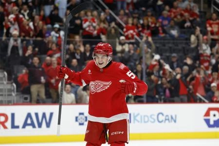 Nov 18, 2025; Detroit, Michigan, USA; Detroit Red Wings center Emmitt Finnie (58) celebrates a goal in the second period against the Seattle Kraken at Little Caesars Arena.