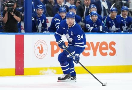 Oct 8, 2025; Toronto, Ontario, CAN; Toronto Maple Leafs center Auston Matthews (34) skates with the puck against the Montreal Canadiens during the first period at Scotiabank Arena