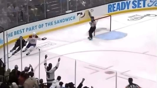 Photo of Canadiens players and Referee Photo of Canadiens players and Referee