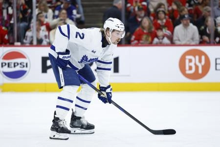 Nov 15, 2025; Chicago, Illinois, USA; Toronto Maple Leafs defenseman Simon Benoit (2) looks on during the first period at United Center. Mandatory Credit: Kamil Krzaczynski-Imagn Images