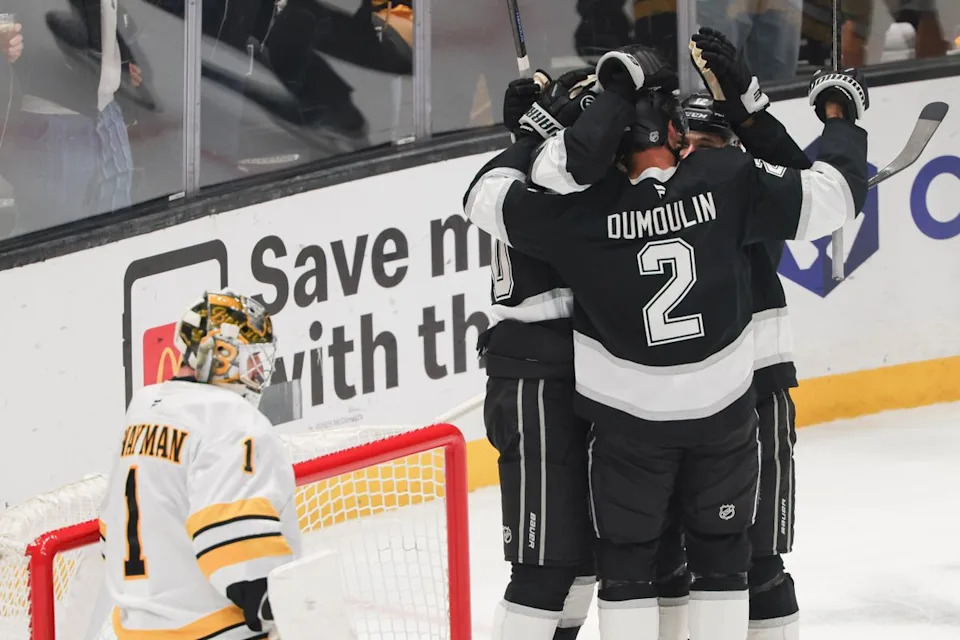 The Los Angeles Kings celebrate the game tying goal late in the third period during an NHL hockey game against the Boston Bruins, Friday November 21, 2025 in Los Angeles, Calif.
