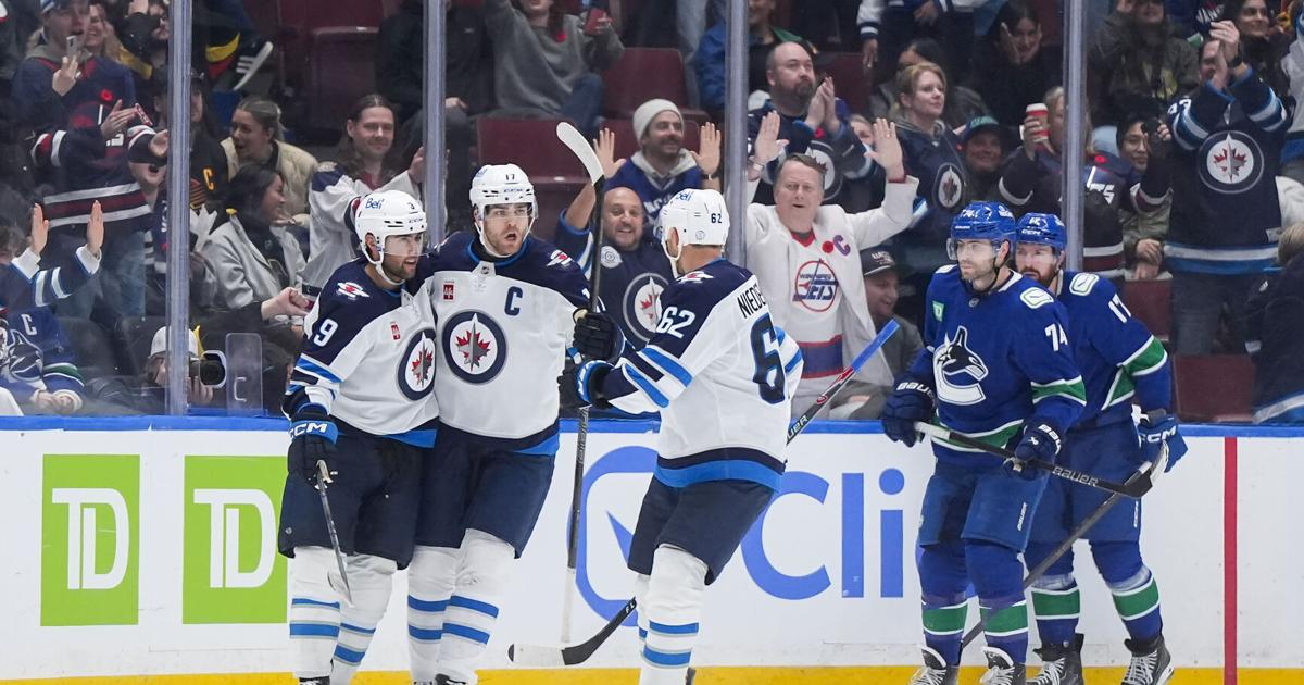 Morrissey and Hellebuyck lead Jets past Canucks 5-3 to halt 3-game slide | Sports