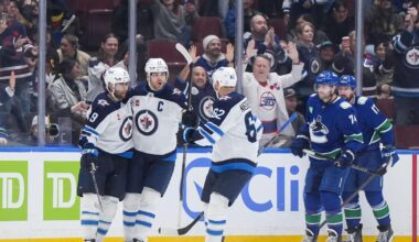 Morrissey and Hellebuyck lead Jets past Canucks 5-3 to halt 3-game slide | National Sports