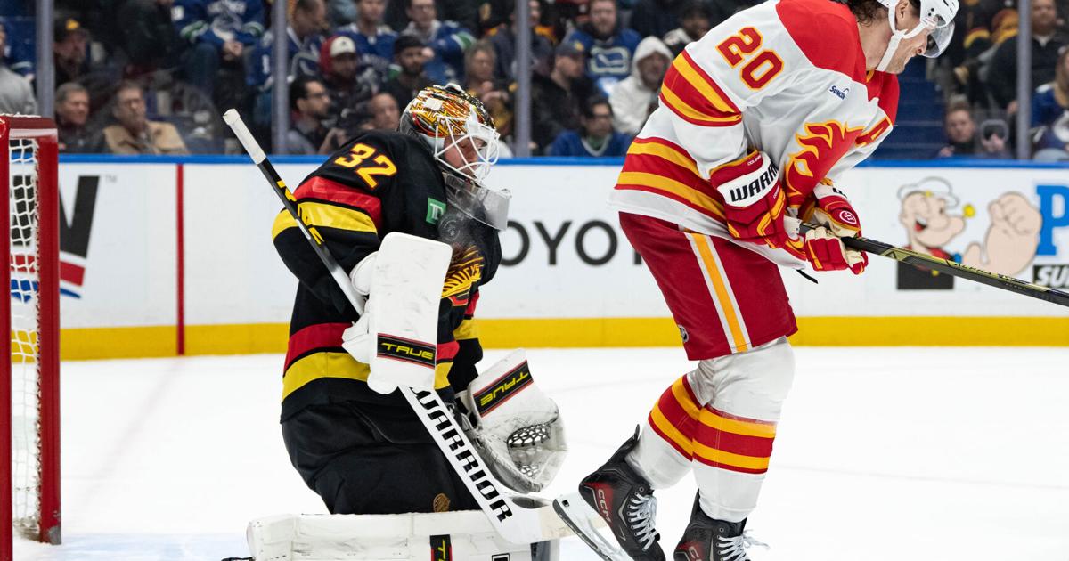 Flames beat Canucks 5-2 to finish back-to-back set with 3rd straight win | Sports