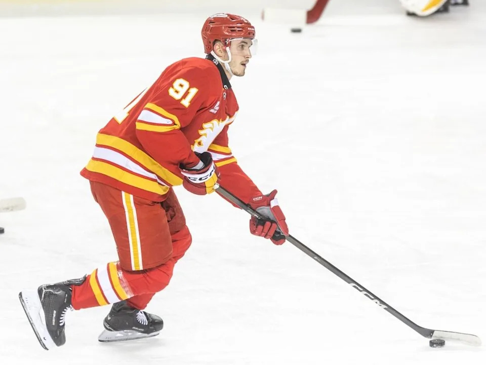  Calgary Flames defenceman Yan Kuznetsov warms up before the game against the Columbus Blue Jackets at the Scotiabank Saddledome.