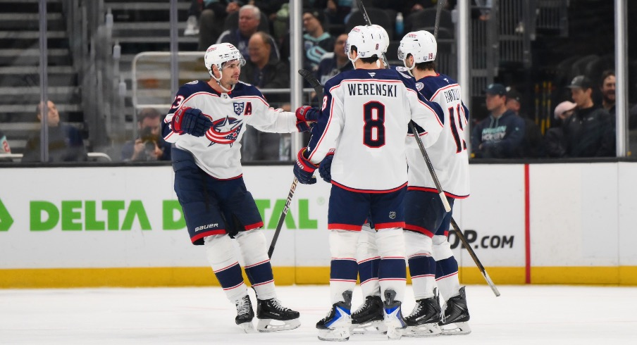 Nov 11, 2025; Seattle, Washington, USA; The Columbus Blue Jackets celebrates after a goal scored by center Adam Fantilli (19) during the second period against the Seattle Kraken at Climate Pledge Arena.