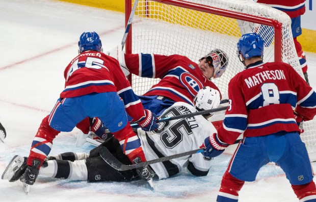Montreal Canadiens goaltender Sam Montembeault (35) loses his mask as...