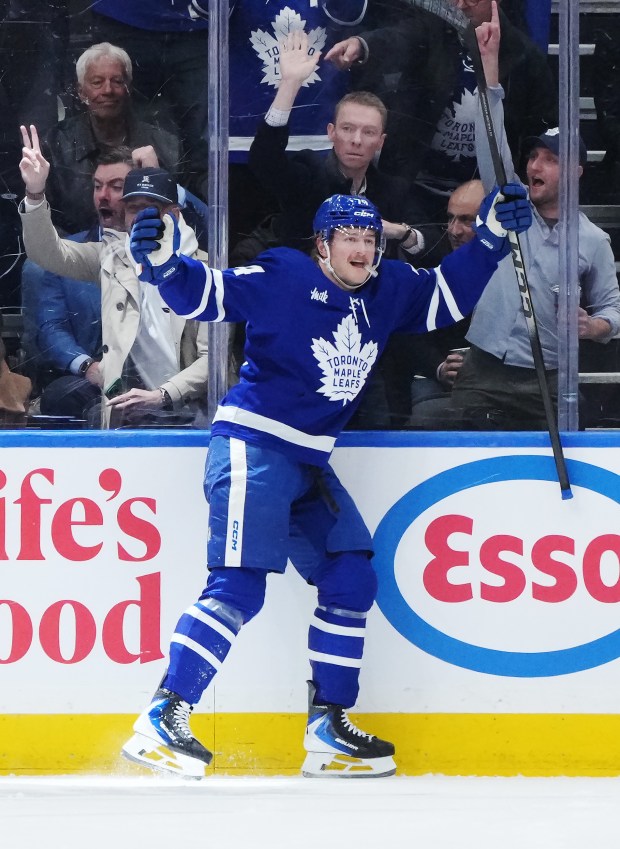 The Toronto Maple Leafs’ Bobby McMann celebrates his goal during...