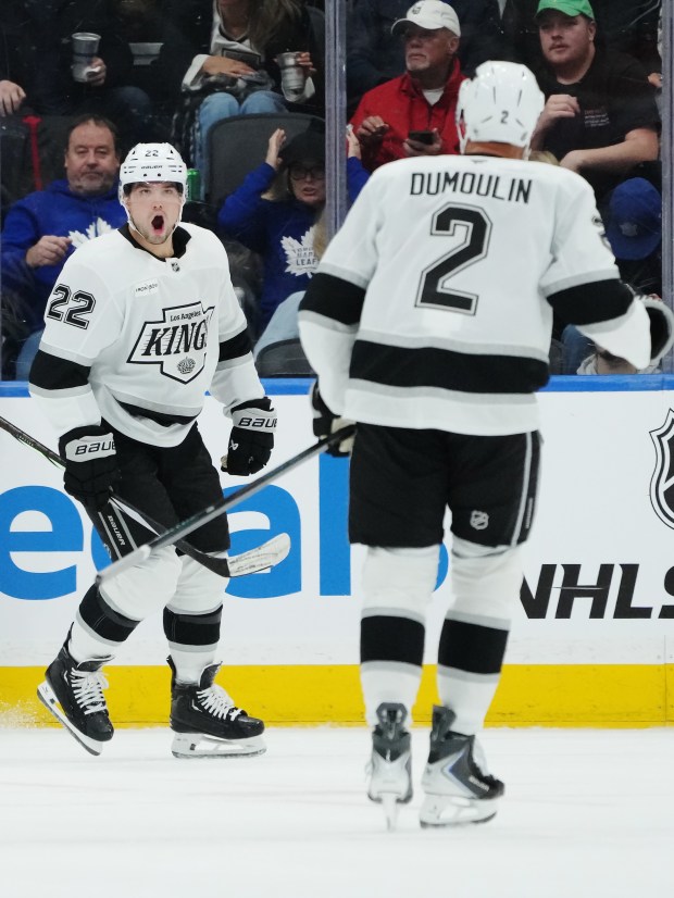 The Kings’ Kevin Fiala, left, celebrates with Brian Dumoulin after...