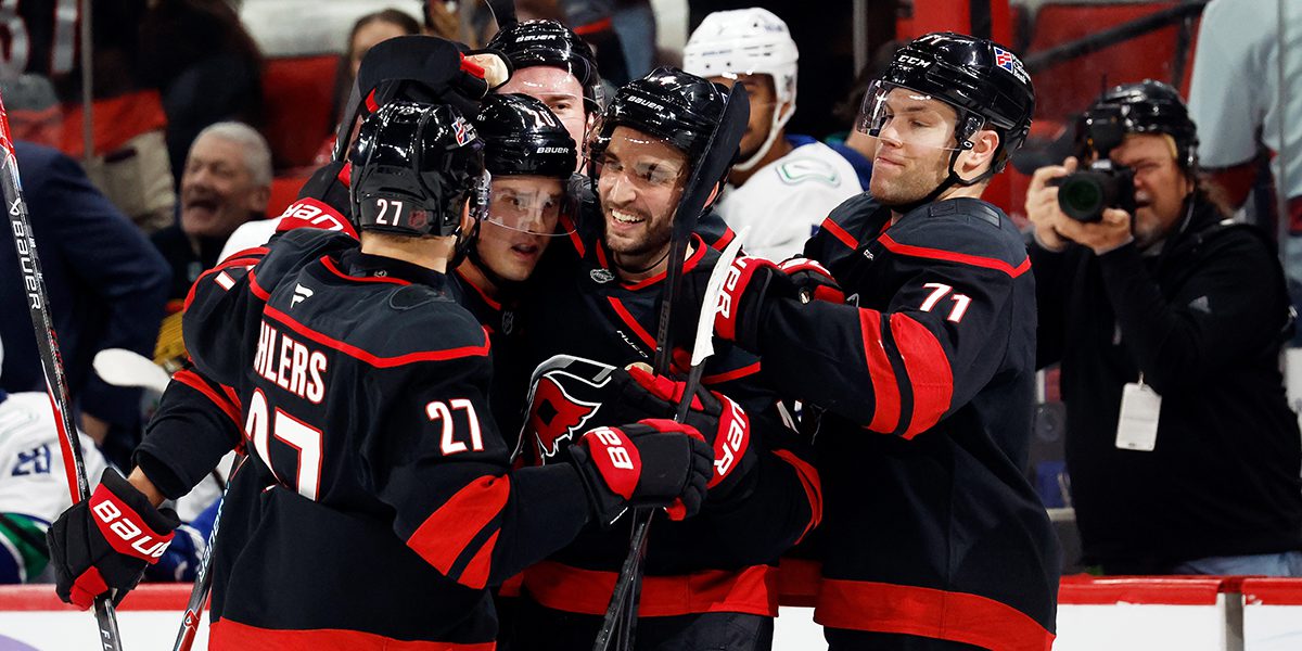 Hurricanes overcome errors, overwhelm Canucks in OT win
