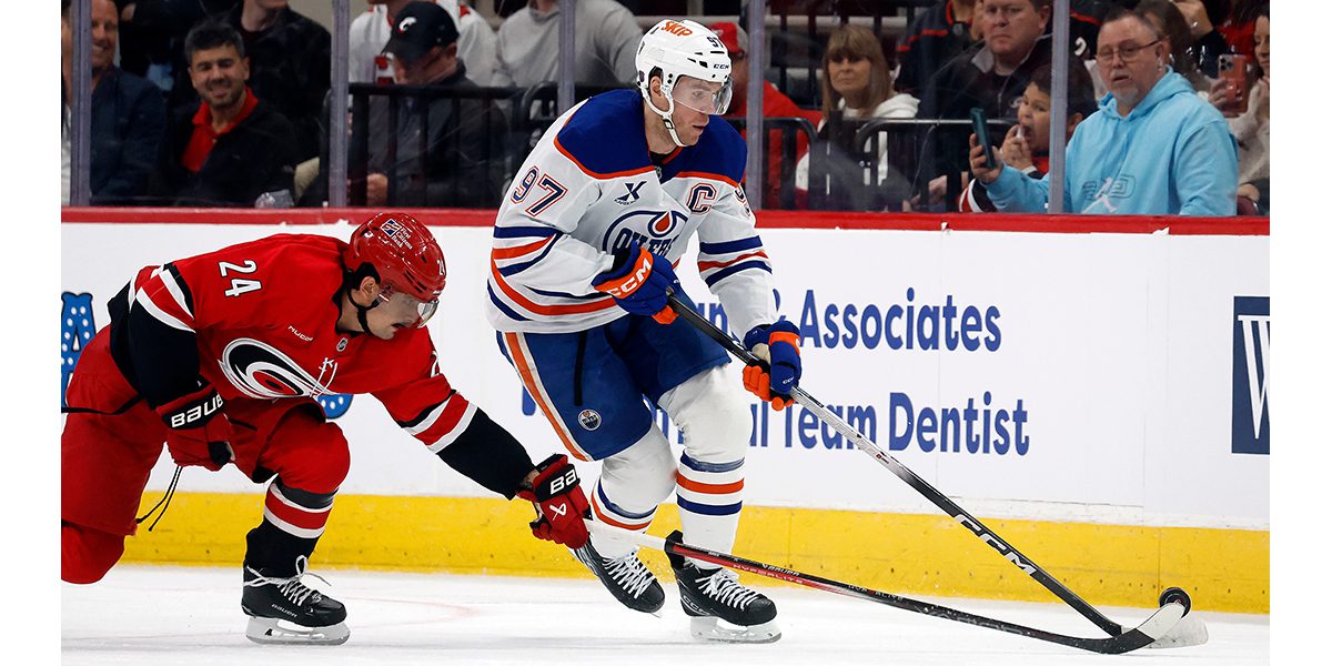 Hurricanes salvage point in OT loss to Oilers