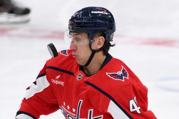 Washington Capitals defenseman Martin Fehérváry watches the puck during the...