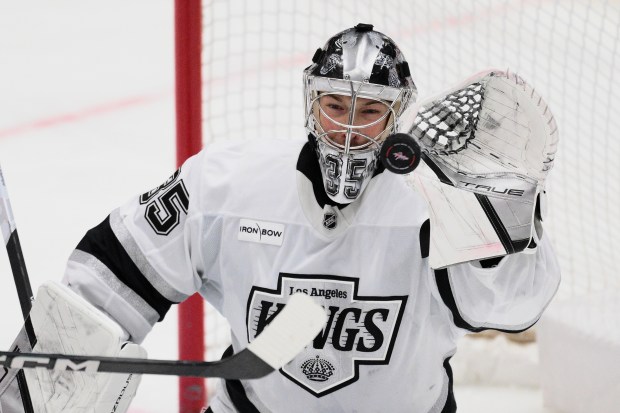 Kings goaltender Darcy Kuemper stops the puck during the third...