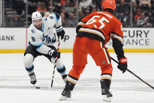Utah Mammoth center Nick Schmaltz (8) passes the puck as...