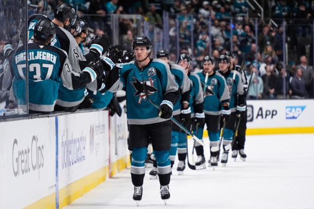 San Jose Sharks center Ty Dellandrea (10) celebrates with teammates...