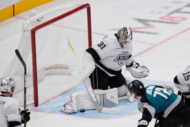 Kings goaltender Anton Forsberg deflects the puck during the second...