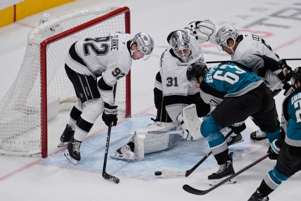 San Jose Sharks center Zack Ostapchuk (63) tries to shoot...