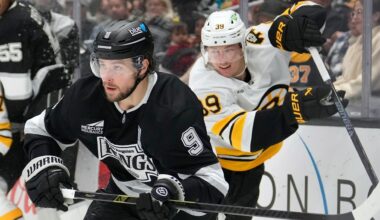 Los Angeles Kings right wing Adrian Kempe, left, skates as Boston Bruins center Morgan Geekie follows during the second period of an NHL hockey game Friday, Nov. 21, 2025, in Los Angeles. (AP Photo/Mark J. Terrill)