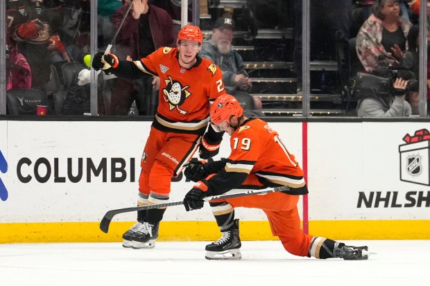 Anaheim Ducks right wing Troy Terry, right, celebrates his goal...