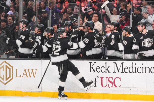 Kings defenseman Brandt Clarke (92) celebrates his tiebreaking power-play goal...