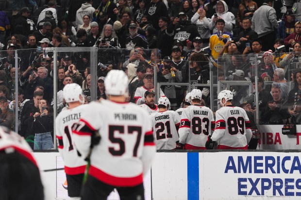 Ottawa Senators players leave the ice after a 2-1 loss...
