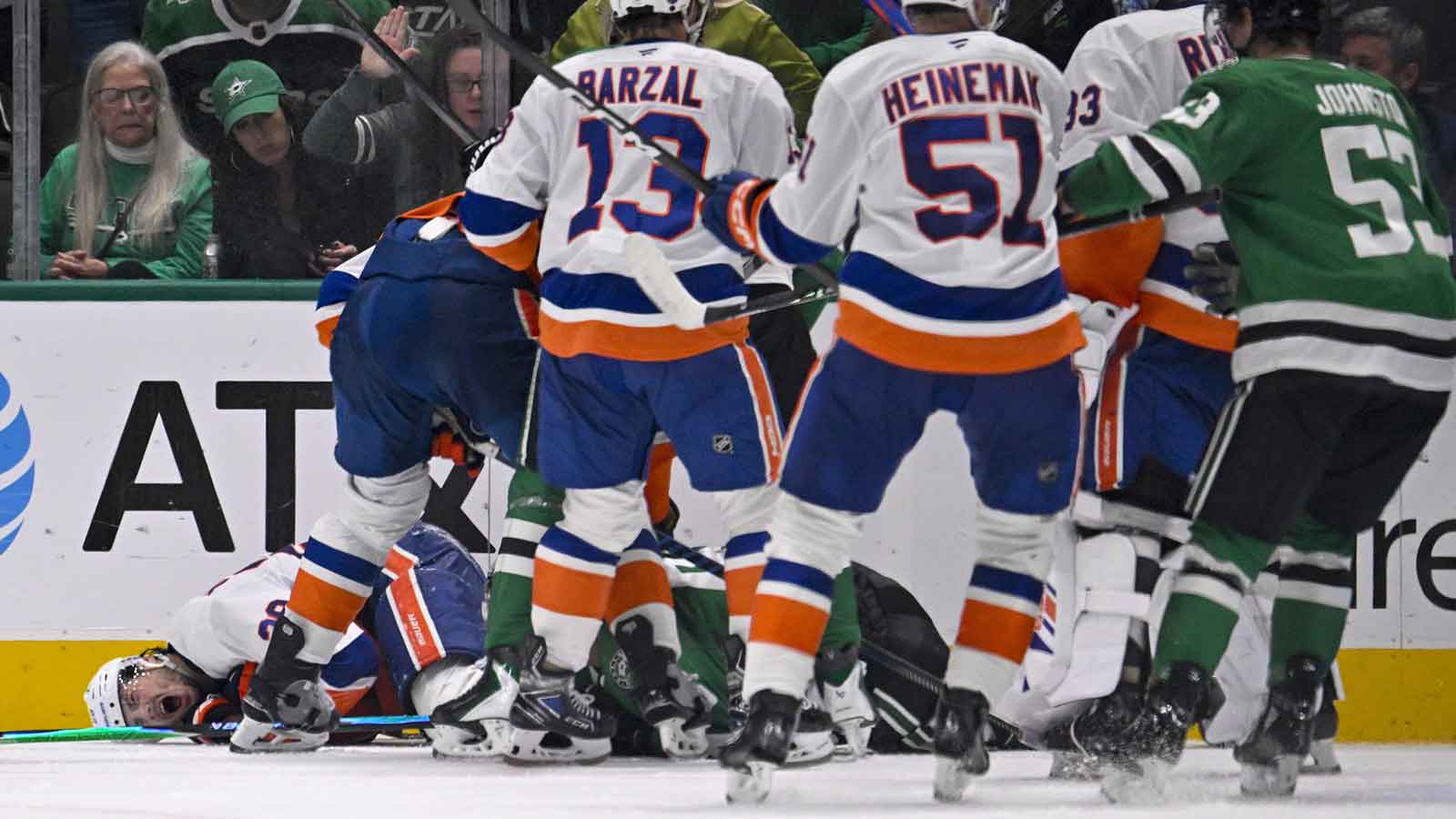 Dallas Stars right wing Mikko Rantanen (96) is called for a game misconduct penalty for boarding on New York Islanders defenseman Alexander Romanov (28) during the third period at the American Airlines Center.