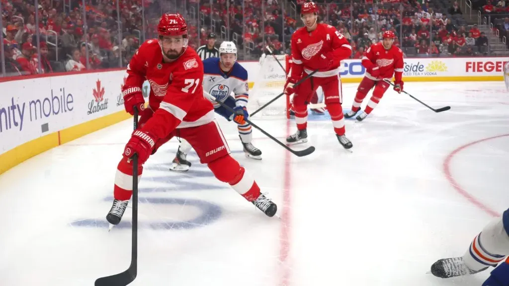 Dylan Larkin #71 of the Red Wings tries to get control of the puck. Gregory Shamus/Getty Images
