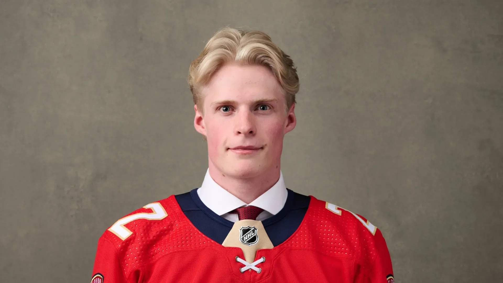 Jack Devine poses for a picture after being drafted by the Florida Panthers