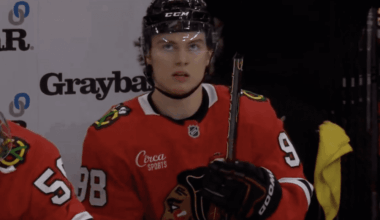 Connor Bedard breaks his stick on the bench during the Chicago Blackhawks 6-3 loss to the Vancouver Canucks.