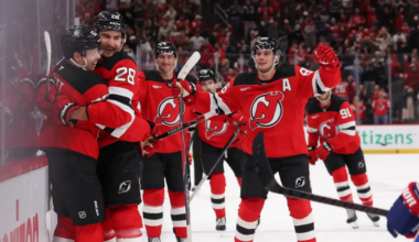 Jesper Bratt and his teammates celebrate his overtime game-winner for the New Jersey Devils against the Montreal Canadiens at the Prudential Center.