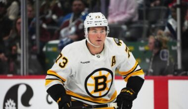Bruins' Charlie McAvoy exits Saturday's game after being hit by puck