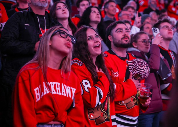 Fans sing the National Anthem before a game between the Blackhawks and Calgary Flames, Nov. 18, 2025, at the United Center. (Dominic Di Palermo/Chicago Tribune)