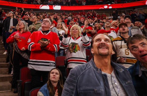Fans cheer after Blackhawks center Connor Bedard's (98) first goal that made the score 2-1 during the second period against the Calgary Flames, Nov. 18, 2025, at the United Center. (Dominic Di Palermo/Chicago Tribune)