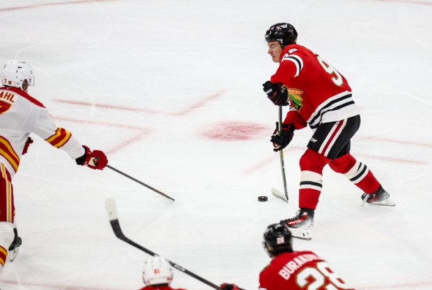 Blackhawks center Connor Bedard (98) scores his second goal during the third period against the Calgary Flames bringing the Blackhawks up 3-2, Nov. 18, 2025, at the United Center. (Dominic Di Palermo/Chicago Tribune)